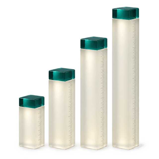 Four glass rulers of different heights.